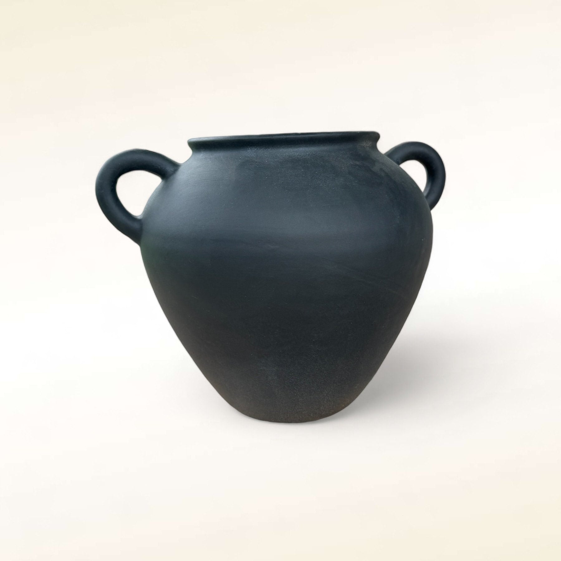 black clay plant pot Black Round Terracotta Vase Pot for Plants and Home Decor rustikehome.com